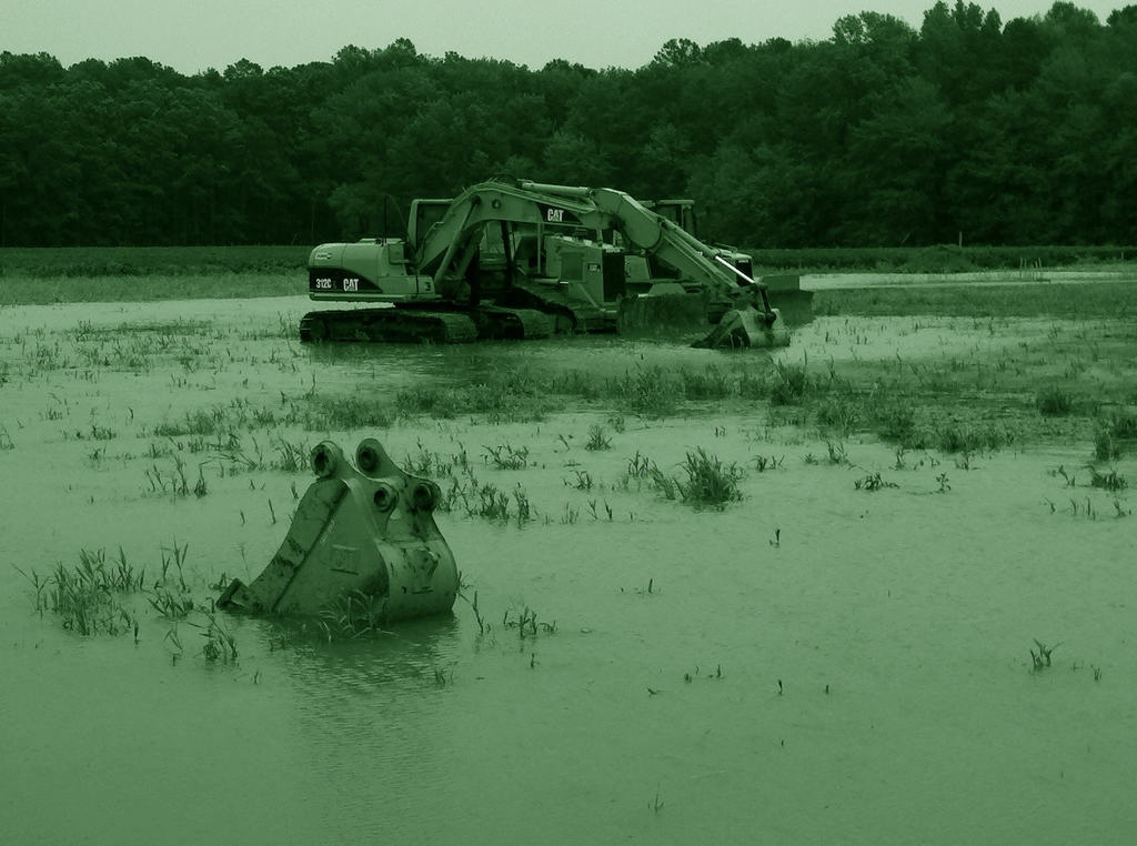 Excavation equipment stored "high and dry" (or so we thought) until a hurricane hit us with 10 inches of rain while we were building the wetland.